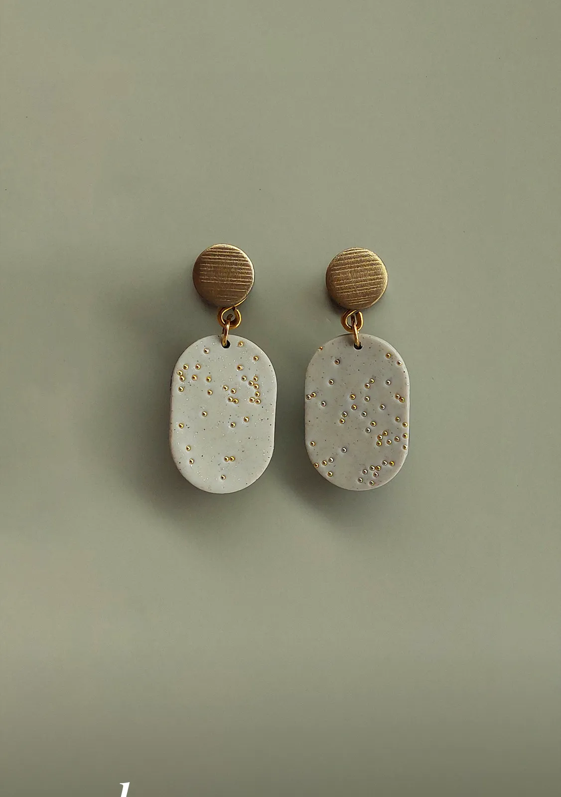 SWITCH 2 oldalas pöttyös fülbevaló