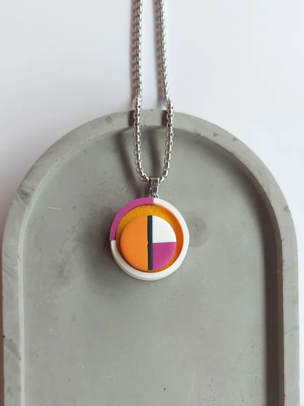 Termék PLAY kinetikus nyaklánc - narancs-fehér-magenta Kép